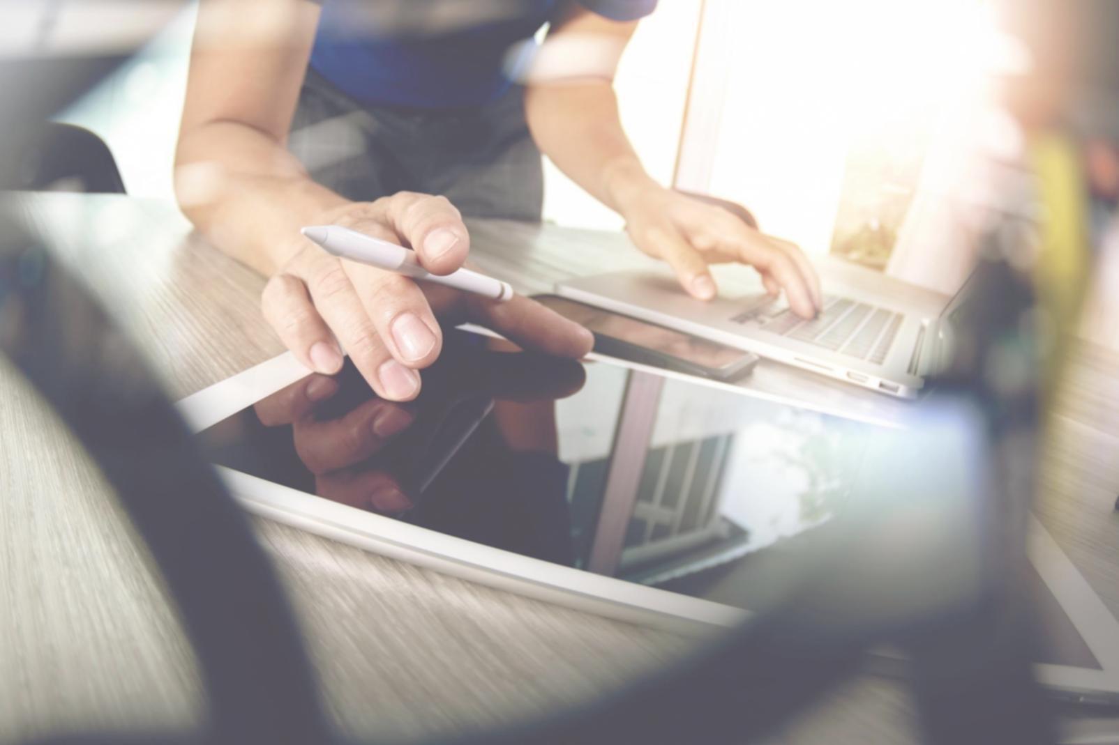 Team collaboration session reviewing mobile interface designs